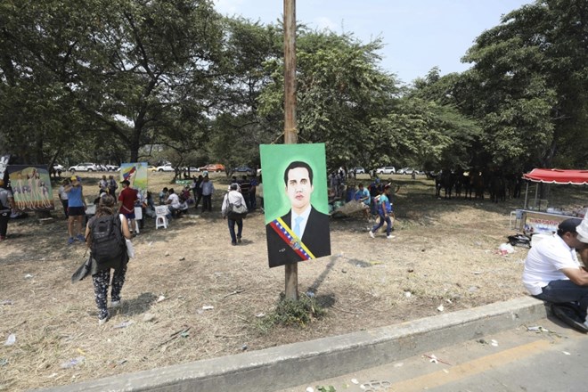 Portret samooklicanega venezuelskega predsednika Juana Guaidoja. Reuters