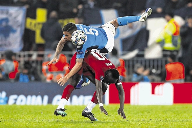 Liverpool (v rdečem) in Napoli sta se razšla z remijem 1:1.