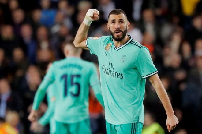 Nogometaša  Reala in Barcelone Karim Benzema (na fotografiji) in Lionel Messi sta izenačena po številu zadetkov v ligi  – oba...