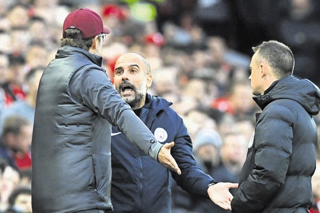 Pep Guardiola (desno) v enajstih poskusih še ni premagal Jürgena Kloppa.