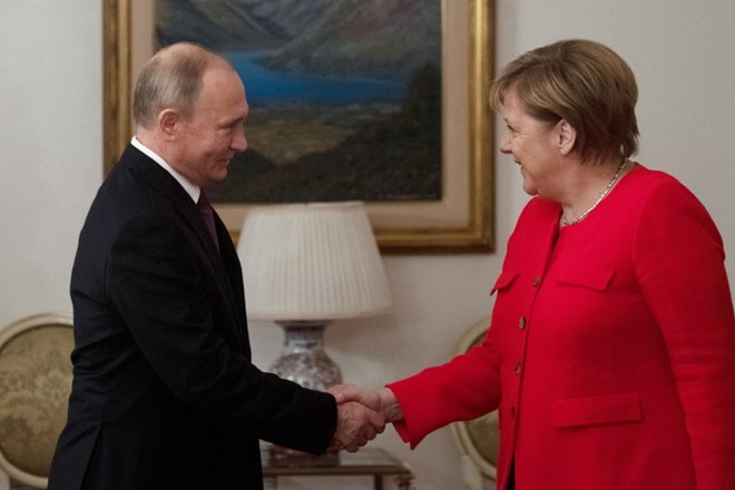 Vladimir Putin in Angela Merkel