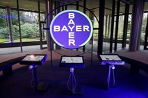 Bayer v četrtletju zaradi sklenjene poravnave z globoko izgubo