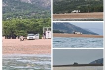 Na Zlatni rt na Braču kar z avtomobilom; iz peska so ga morali izkopati